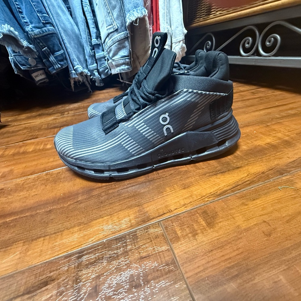 On Running with Black Athletic Shoes